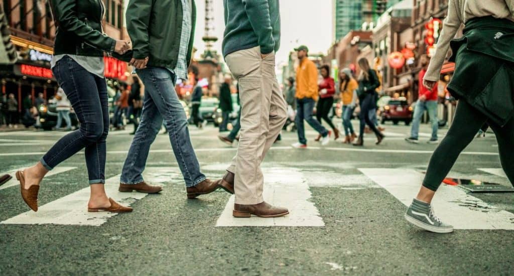 people walking on pedestrian lane during daytime