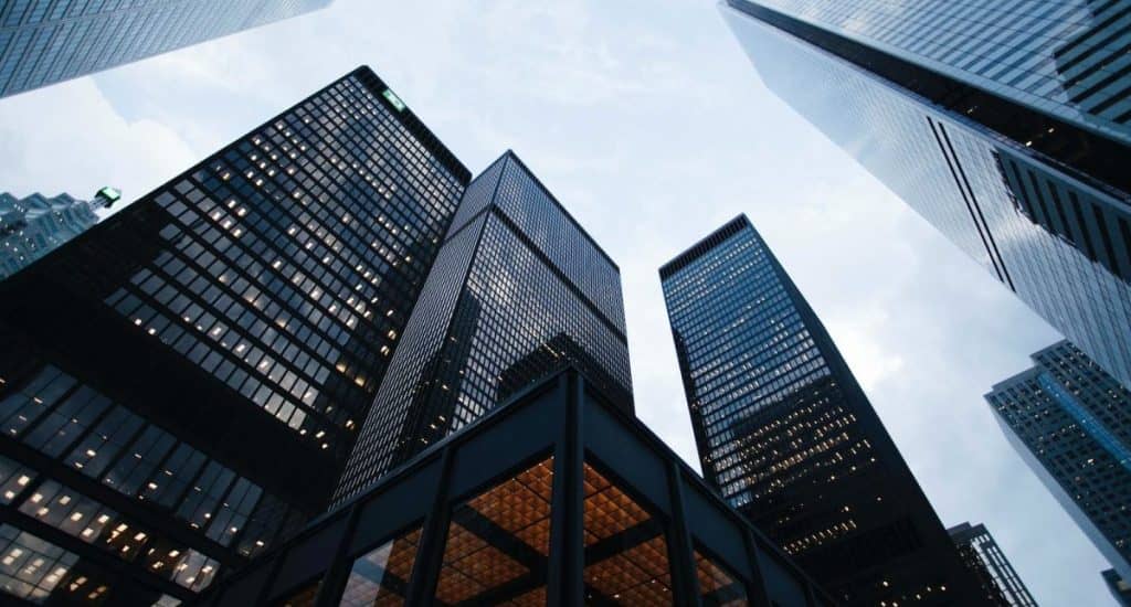 low angle photo of city high rise buildings during daytime